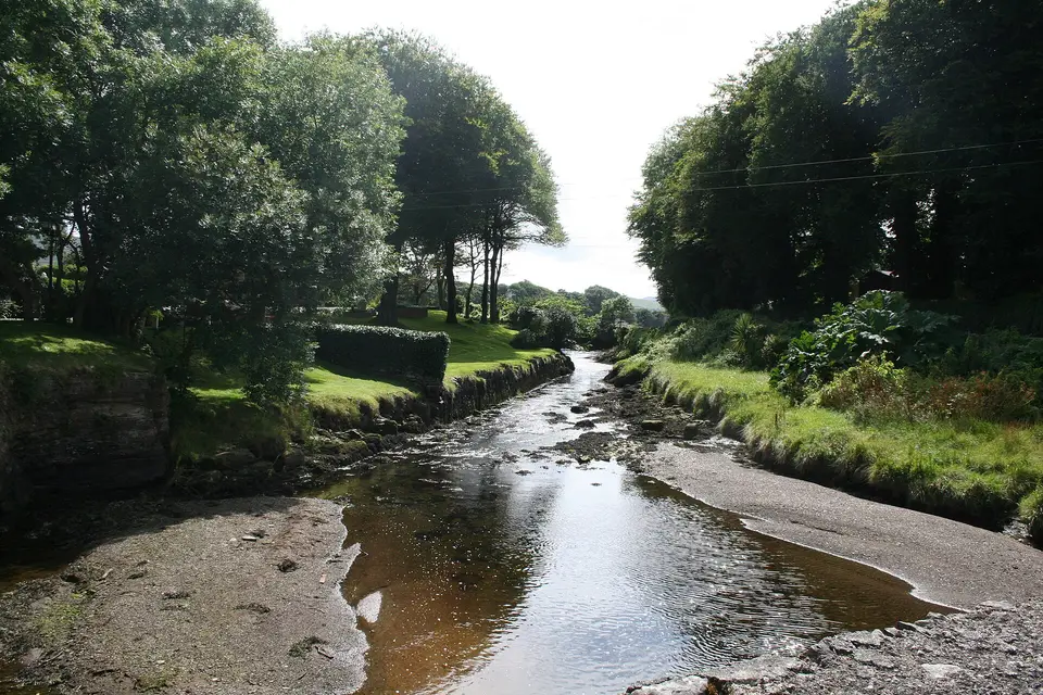 Ahanegavanagh Stream Pictured flowing past the church before entering the Four Mile Water and Dunmanus bay.
