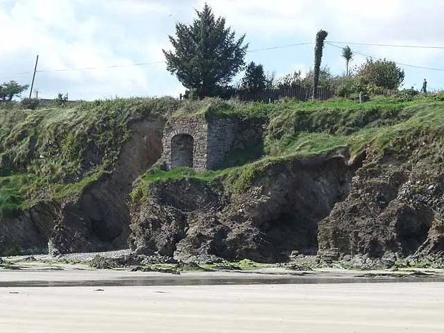 Arch in the cliffs at Grange Beach