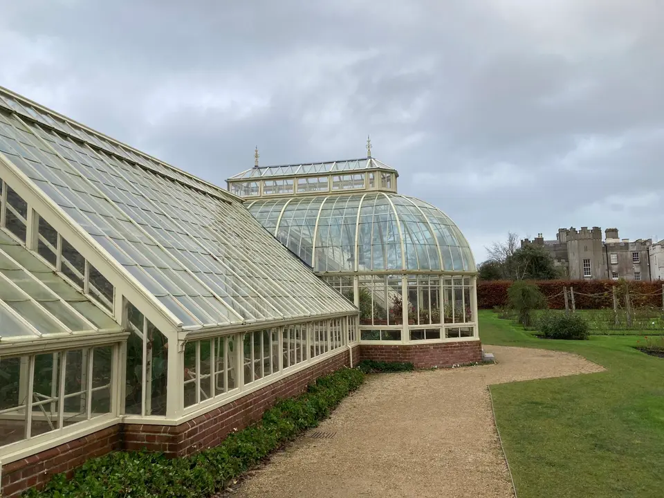 Side view of the main greenhouse, castle in the background.