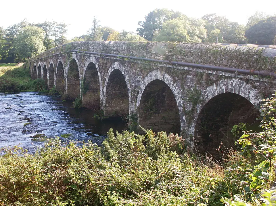 Ballineen Bridge was widened in the late 18th century. You can clearly see where the bridge was widened by looking at the inner face of the arches.
