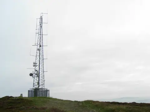 Ben of Howth Radio Mast Radio mast on the Ben of Howth, the highest point of Howth Head. Lambay Island is the distance behind.