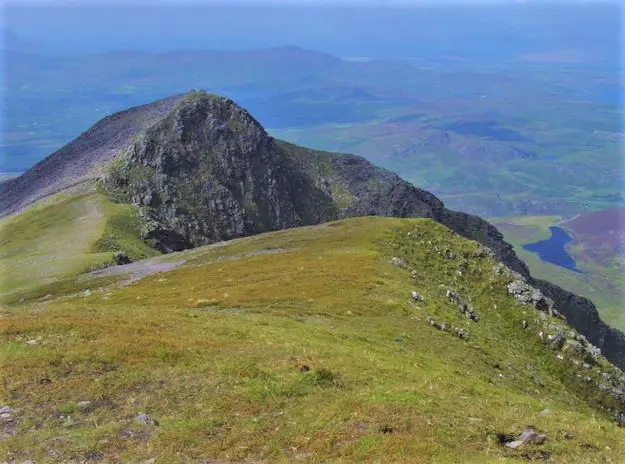 Caher West top from Caher The walk up over Caher makes an excellent ridge walk to gain Carrauntoohil the highest mountain in Ireland.