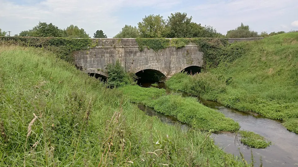 This stone aqueduct carries a path, the Barrow branch of the Grand Canal, and a road over the Stradbally River, just south of Vicarstown, County Laois, Ireland