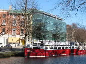 Canadian Embassy at 7-8 Wilton Terrace, Dublin, with the barge Riasc on the Grand Canal