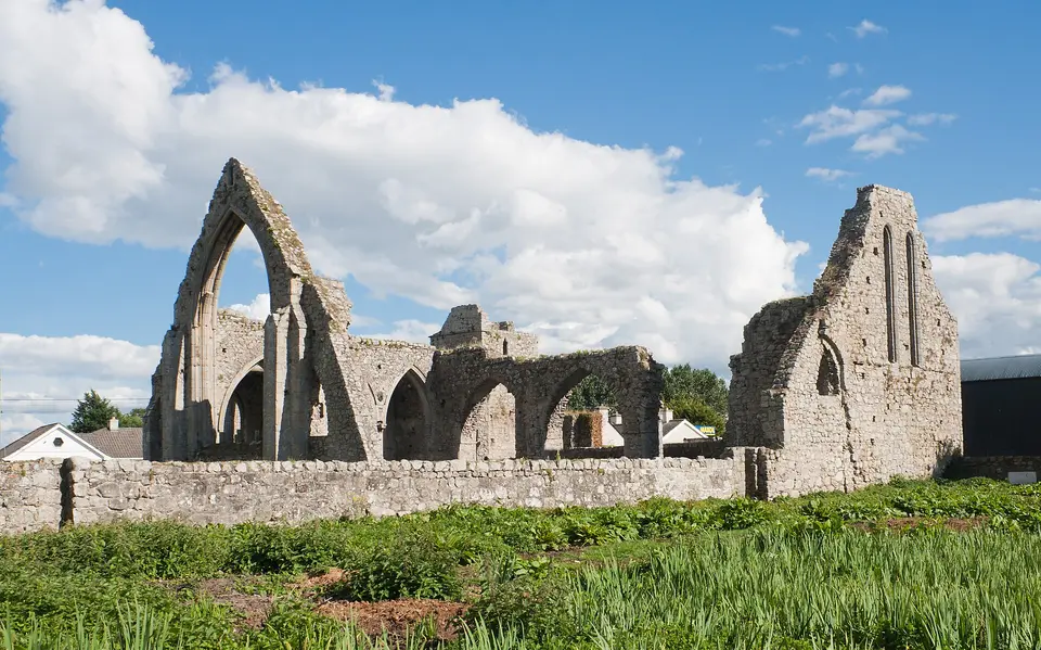 North-west view of the friary with the north transept and its north window on the left and the west gable of the nave.