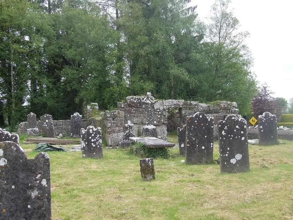 The western elevation of the ruins of the church of Saint Mel, Ardagh, County Longford. Viewed from the the corner of Saint Patrick's church on the same site across the graveyard.