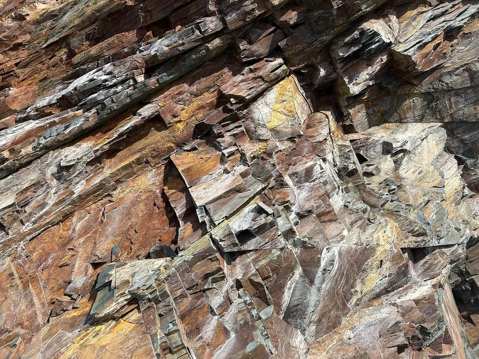 The rugged cliffs and secluded coves of the Copper Coast UNESCO Global Geopark in County Waterford showcase Ireland's rich geological heritage and breathtaking coastal beauty.
