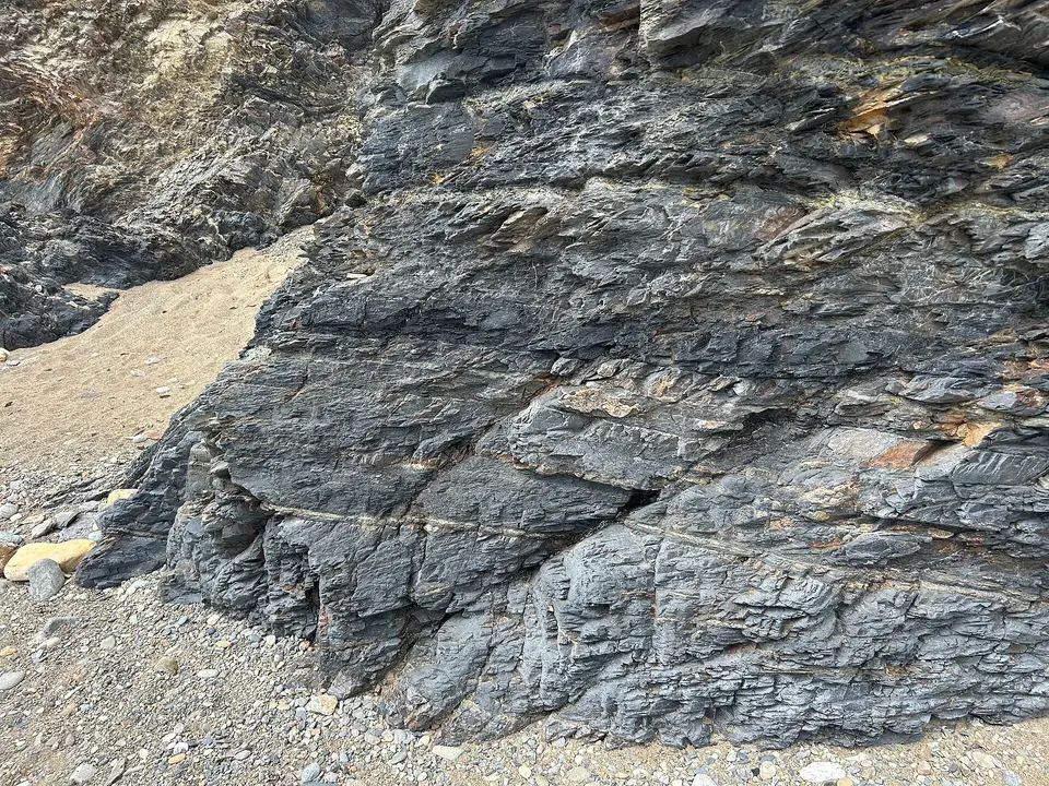 The rugged cliffs and secluded coves of the Copper Coast UNESCO Global Geopark in County Waterford showcase Ireland's rich geological heritage and breathtaking coastal beauty.