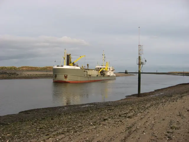 Dredger at Mornington, Co. Meath The dredger 'Sospan Dau' on the Boyne at low tide.