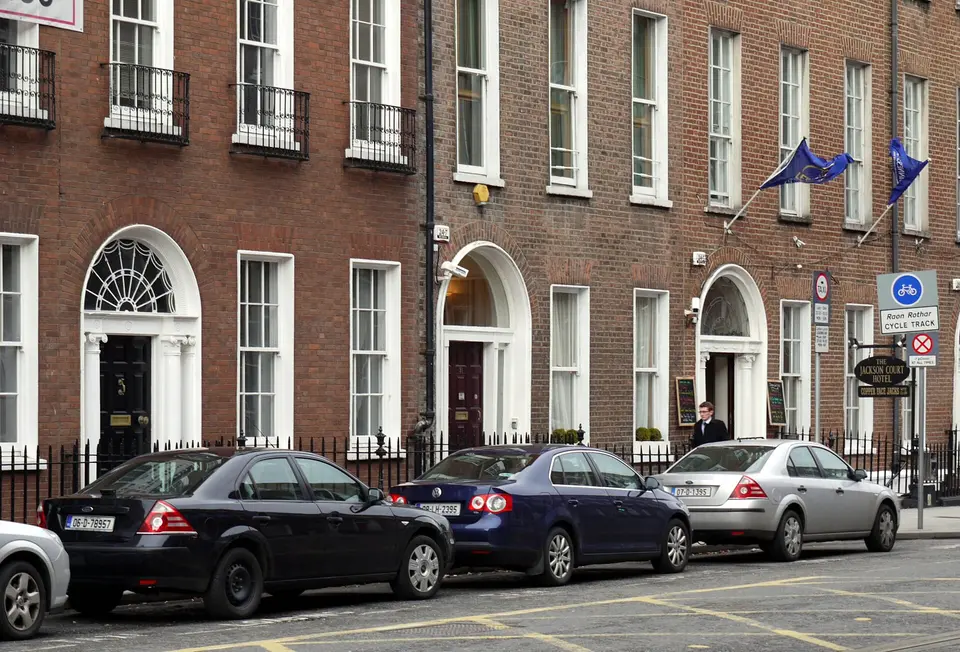 Unmarked Garda (police) cars a few meters away from An Garda Síochána station on Harcourt Street.