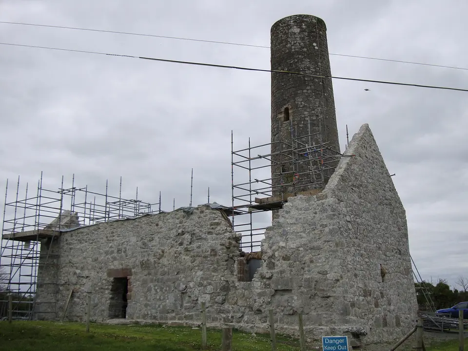 The remains of Dysert Aenghusa Monastery and Round Tower near Croom in County Limerick, Ireland