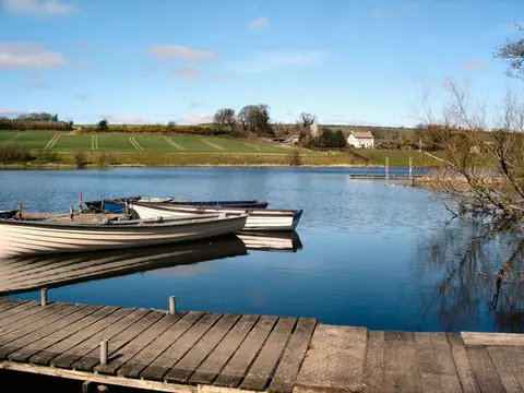 Enagh Lough Jetty Jetty at Lough Enagh western and farm by the lakeside.