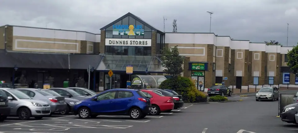 This is a photo taken in the centre's carpark of the exterior of the Harbour Place Shopping Centre which is located in Mullingar, Co. Westmeath, Ireland.