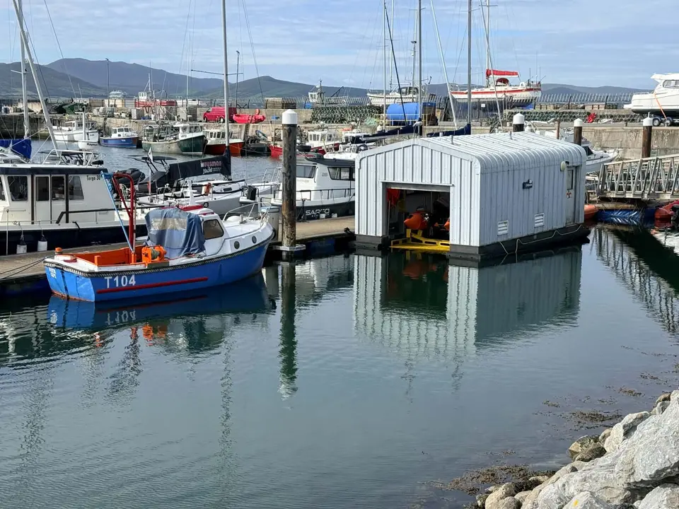 Floating boathouse housing the Fenit RNLI D-class Inshore lifeboat