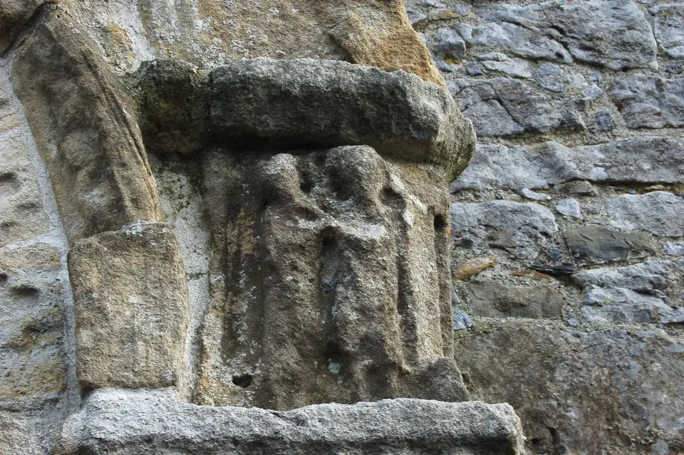 Detail on the 12th century doorway into St. Lachtain's Church (right side) depicting two people