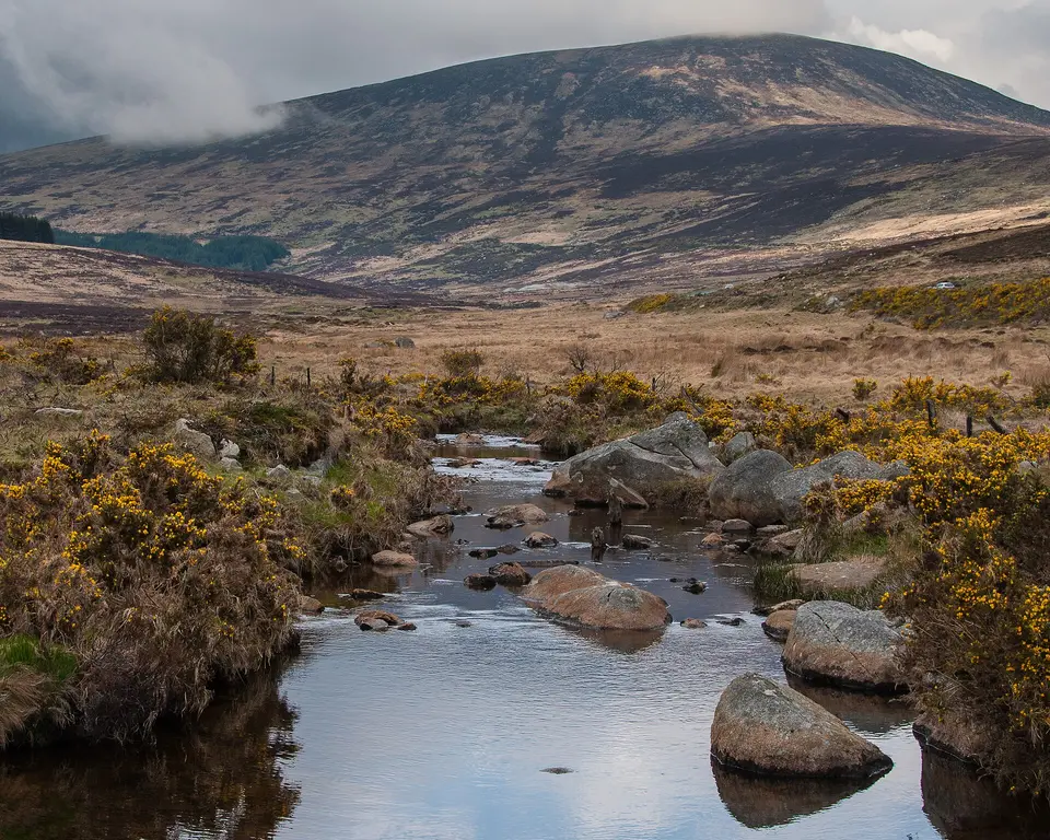 The Glendasan river in the Wicklow Mountains, County Wicklow, Ireland. In the background is Tonelagee, the third highest mountain in the range.