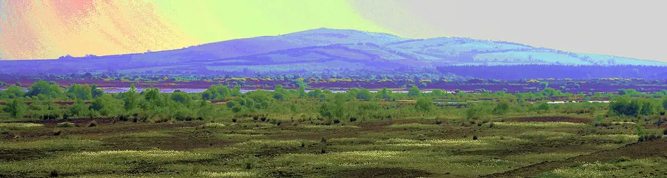 Severely enhanced vision of Croghan Hill rising from the Bog on Allen in County Offaly, Ireland