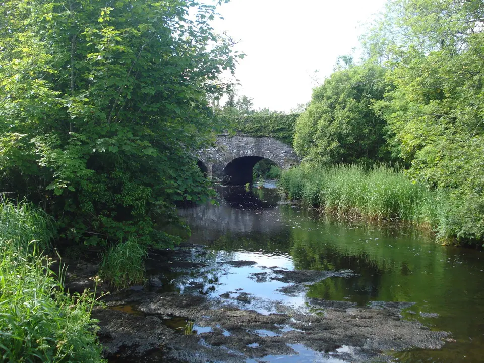 Inagh River in County Clare. Passing Inagh on her way to Ennistymon, Lahinch and Liscannor Bay. The road over the bridge is the R460 Inagh-Milltown Malbay.
