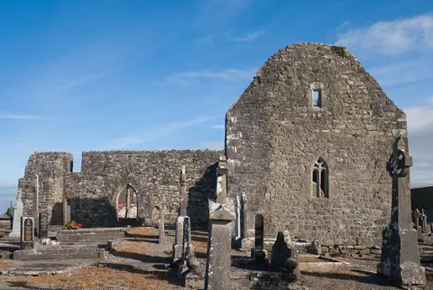 South view of the old church of Kilmaine with a 16th-century tracery window on the site of an early Christian monastery.