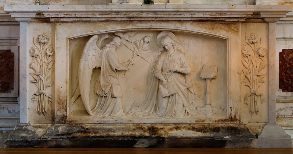 Altar relief the Immaculate Conception Altar, depicting the Annunciation. The altar is scarred from the 2009 fire in the cathedral.