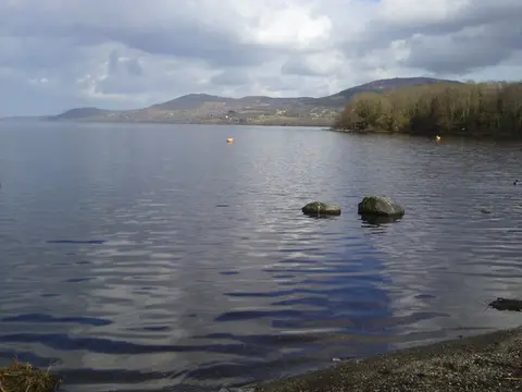 Lough Derg, Ballycuggaran, Co Clare View of Lough Derg from Co Clare shore facing Tipperary shore in the distance.