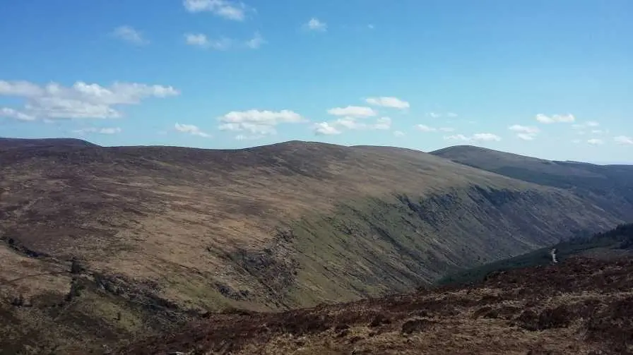 Summit of Lugduff from across the Glenmalure valley on Camenabologue