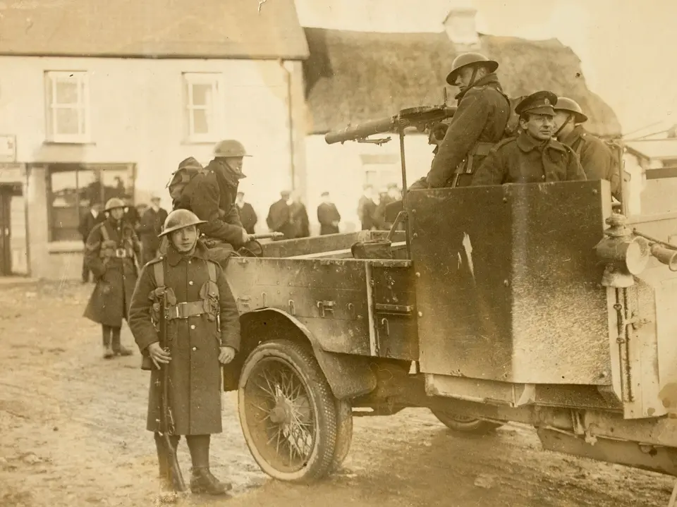 Military carrying out official reprisal following an ambush in Meelin, Co. Cork (29988005920)