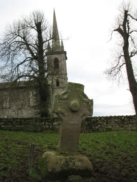 Nurney cross An ancient cross located within sight of the church in Nurney. Access is via a very narrow step and rough terrain, but worth the trouble.