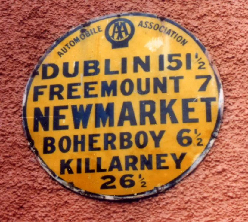 Old In Ireland, circular, similar to the early design style: no black line, only AA badge at top