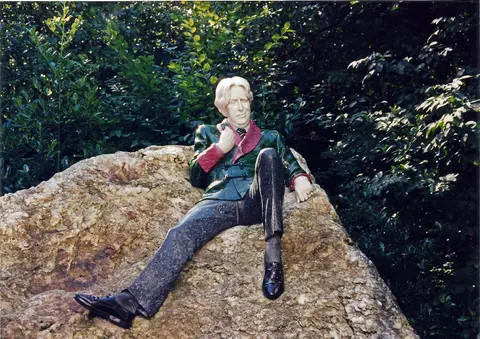 Front view, medioum close, of the statue of Oscar Wilde in Merrion Square, Dublin. Taken Sept 1998, scanned at 600 dpi Jan 2019.
