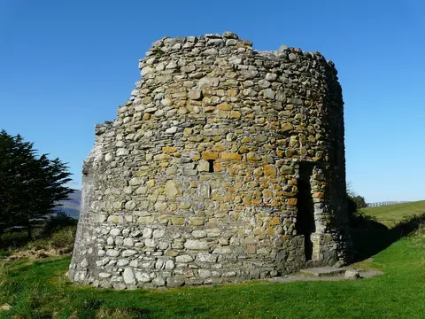 Remains of Parkavonear Castle in Aghadoe outside Killarney, Ireland. The Norman castle had a rare circular keep surrounded by earthworks.