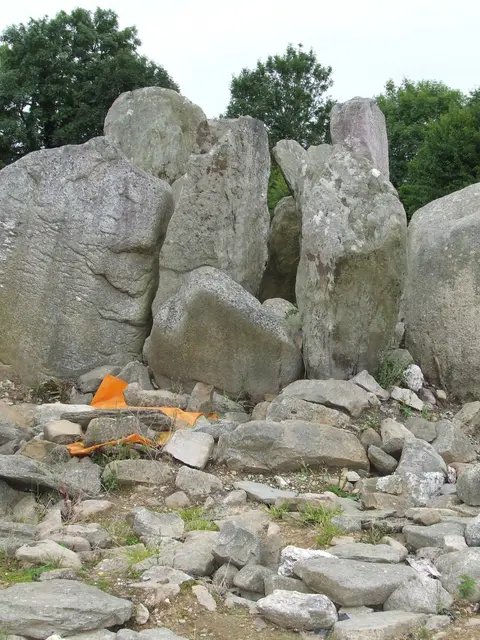 National monument. Passage tomb. Aligned with the rising sun on the Winter solstice. Located at Knockroe, County Kilkenny.