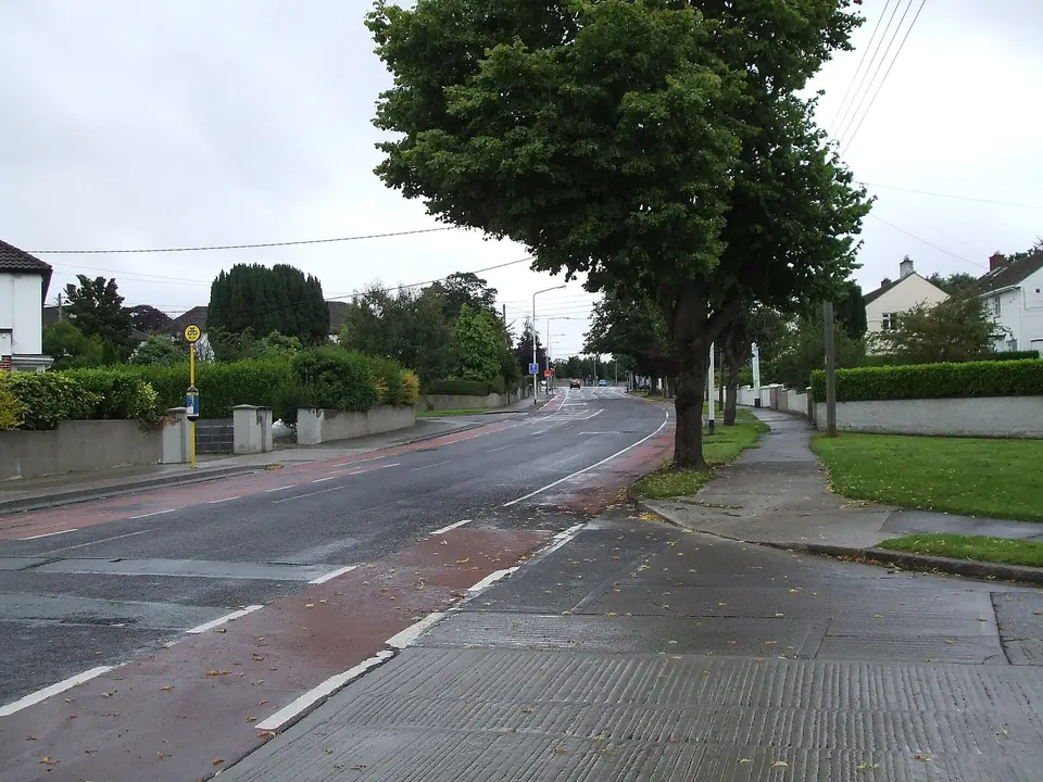 View facing south along the R825 road in Goatstown in Dublin in Ireland, at its intersection with Farmhill Park (right).