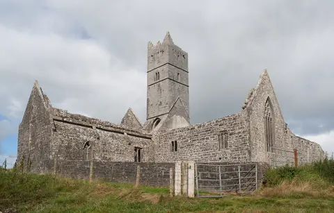 South-east view of Rosserk Friary. From left to right: south transept, tower, choir with east window, dormitory.