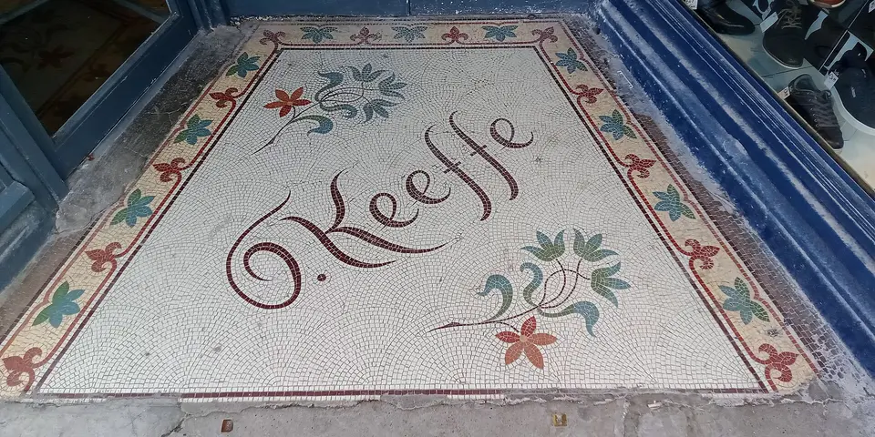 shop entrance mosaic O'Keeffe on O'Connell Street, Clonmel