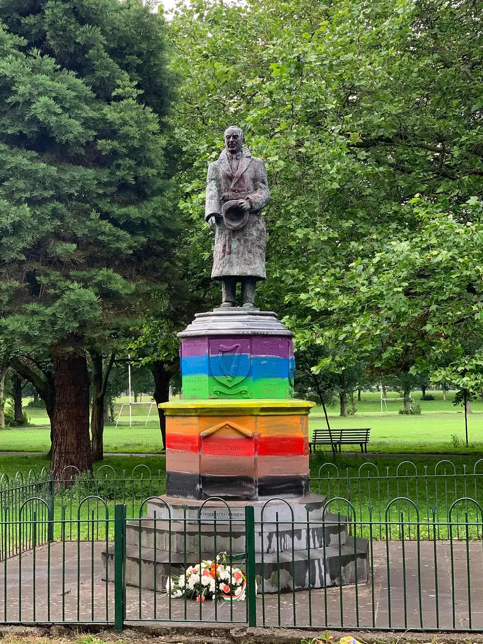 A photo of the Sean Russell statue in Fairview Park, Dublin, Ireland when it was painted with a rainbow base.