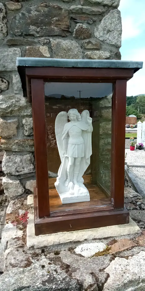 statuette of Saint Michael at Saint Michael's Church (church ruin in Tinnahinch, Co. Carlow)