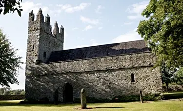 The restored St. Mary's Church, Castlemartin Estate, Kilcullen Bridge, Co. Kildare, Ireland, with surrounding graves, including those of Tony (Sir Anthony) O'Reilly's parents.