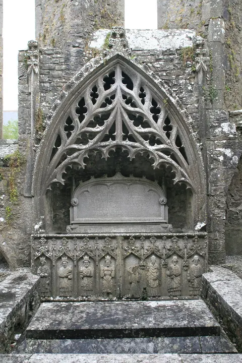 15th-century sculptured tomb in the north wall of the chancel of Strade Friary.