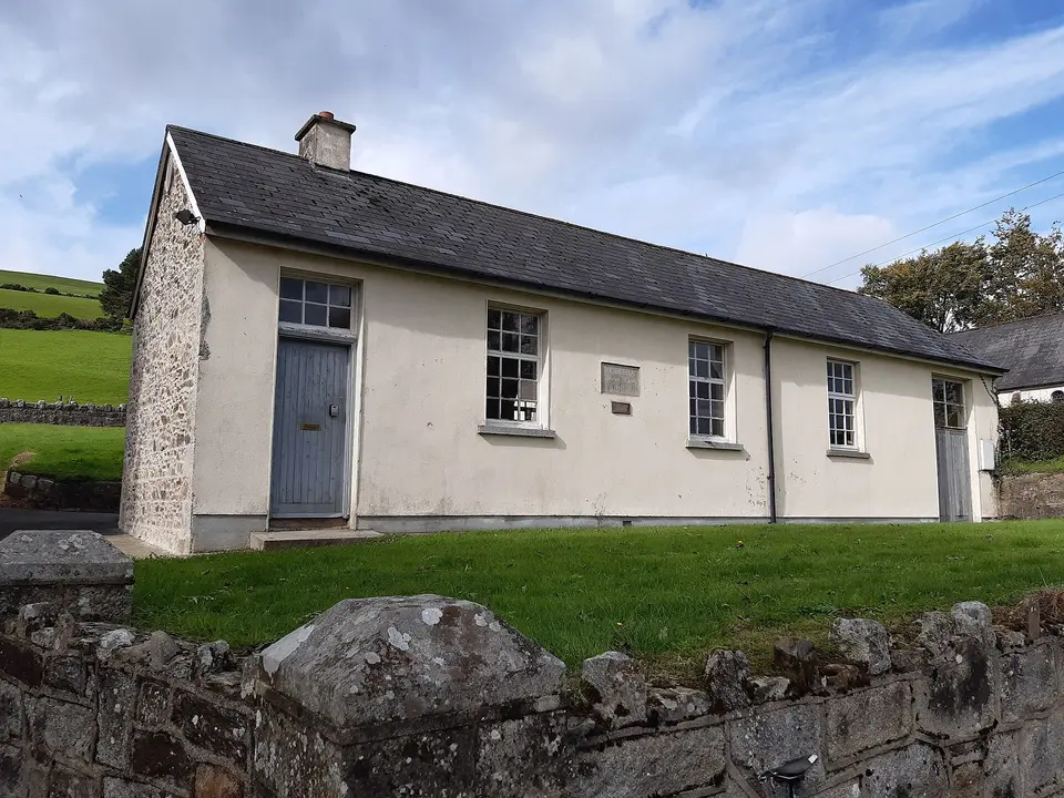 Askinagap. National School. 1897. Ballycurragh Hill (536m) rises up behind the village to the NW.