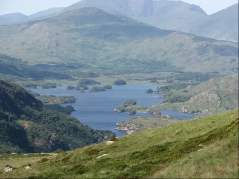 TJBrosnan 15:55, 22 August 2006 (UTC)TJ Brosnan Taken from top of Torc overlooking the Uppper Lake and the Black Valley in the distance.