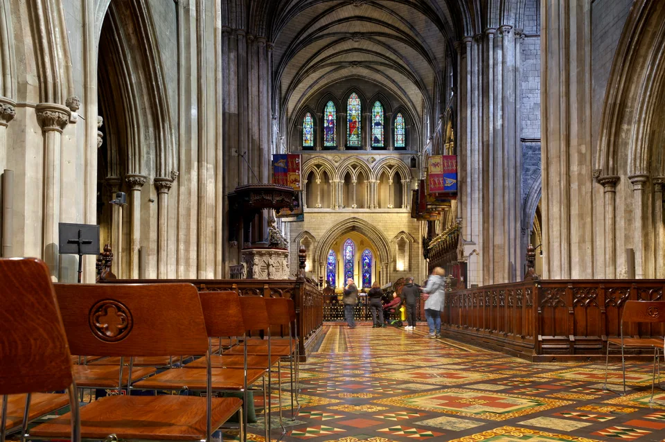 The nave and stained-glass windows of St Patrick's Cathedral.
