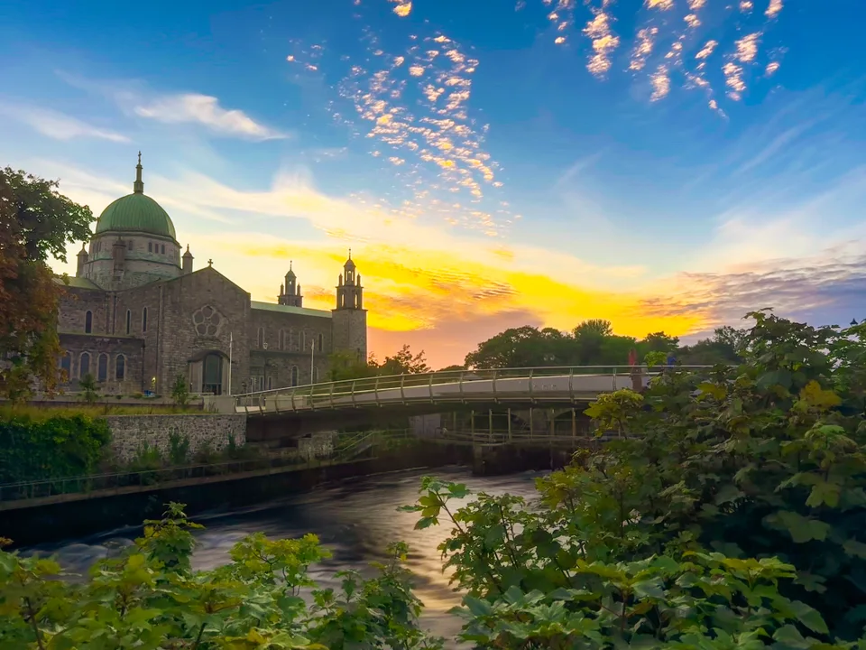 Galway Cathedral and the River Corrib in the evening light.