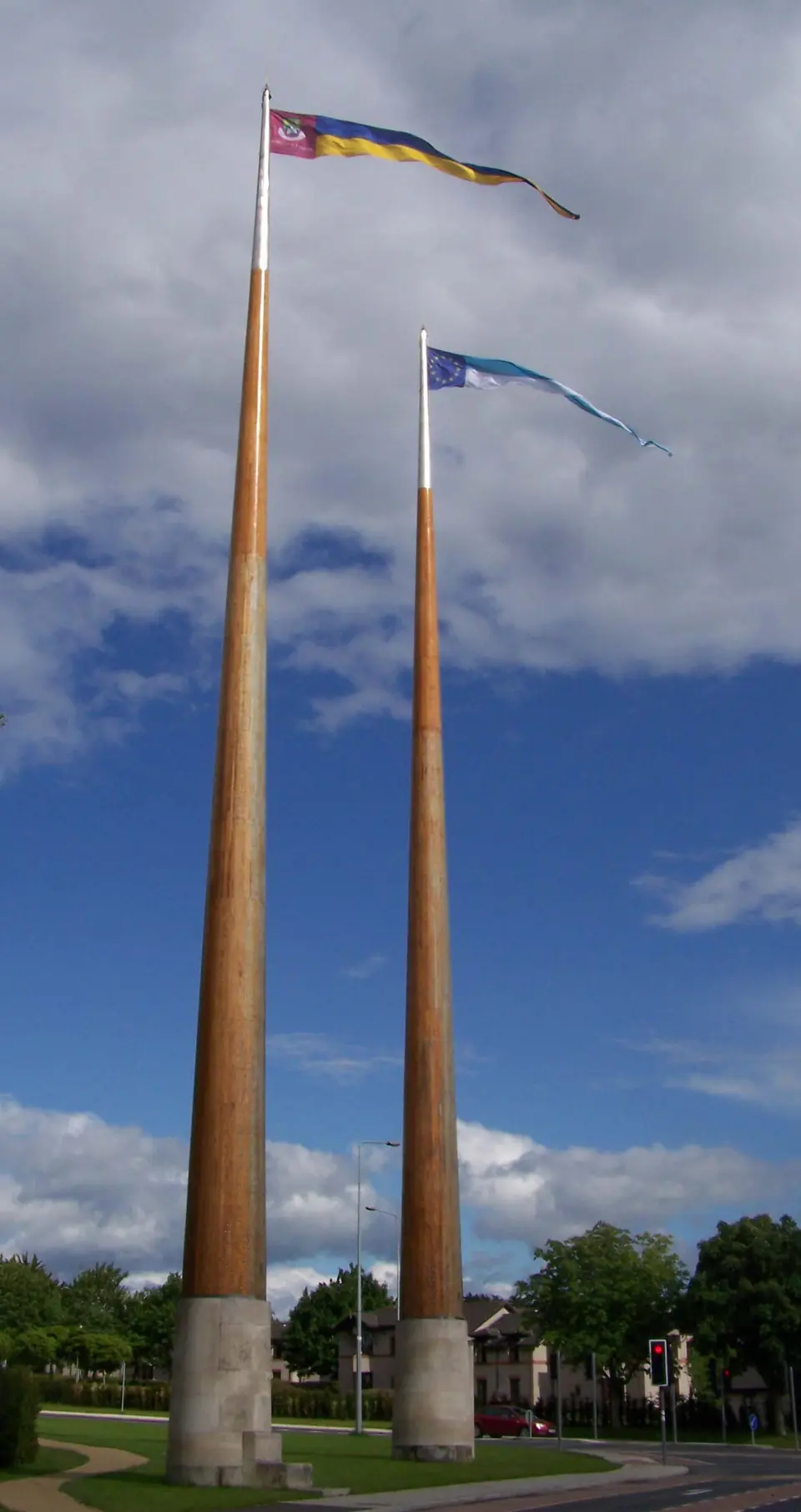 The "twin tower" flags at the main entrance to the University campus.