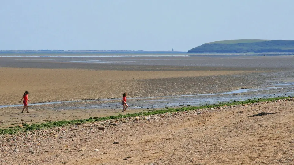 View of Creaden Head with the Hook lighthouse in the distance